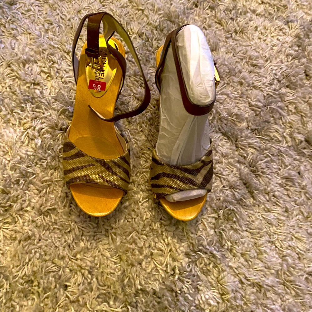 Michael Kors animal print word wedge heel size 8.5. New tags still on.